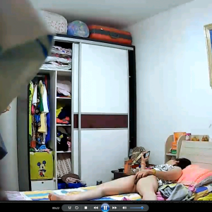 0079-Hiddencam captures a Chinese housewife masturbating while watching porn on the bed